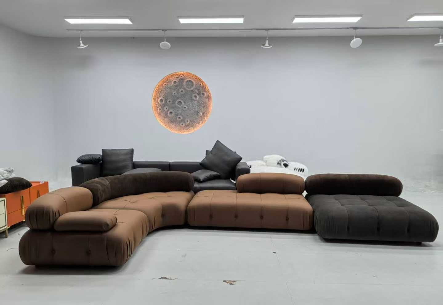 Modern luxury furniture showroom displaying sofas tables and chairs made by leading Chinese furniture suppliers